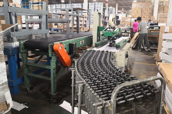 Colorful stacked shipping containers at a port exemplify global logistics.